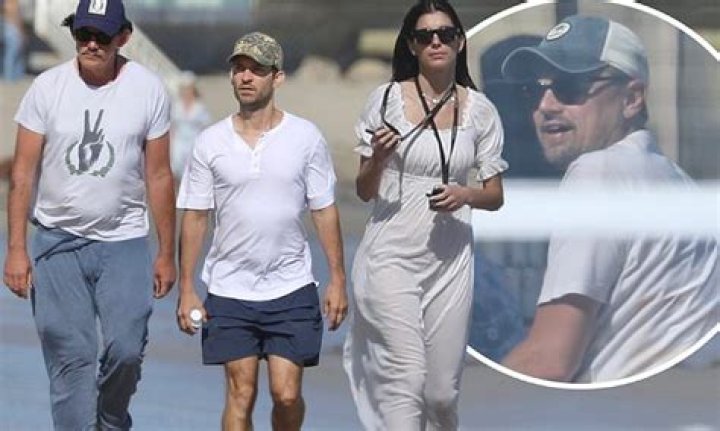 bitchy | Leonardo DiCaprio and Camila Morrone enjoy a day at the beach with Tobey Maguire and Lukas Haas