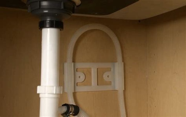 How do you cap a dishwasher drain?