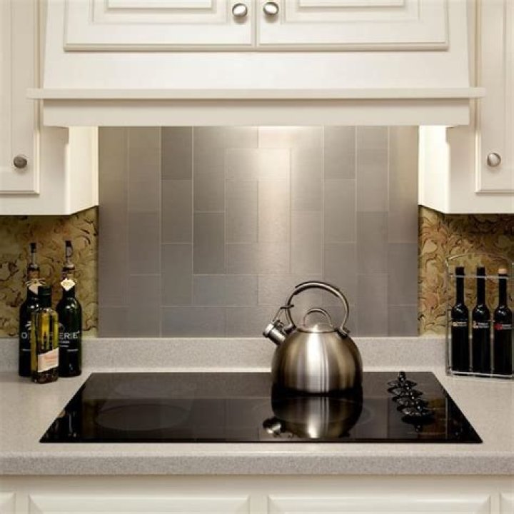 How do you install stainless steel backsplash?