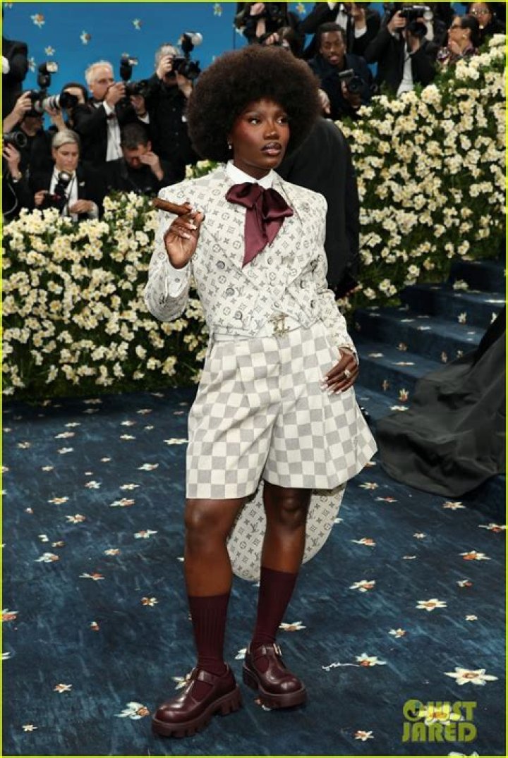 Kate Upton in tiered Louis Vuitton at amfAR gala: could anyone wear this dress?