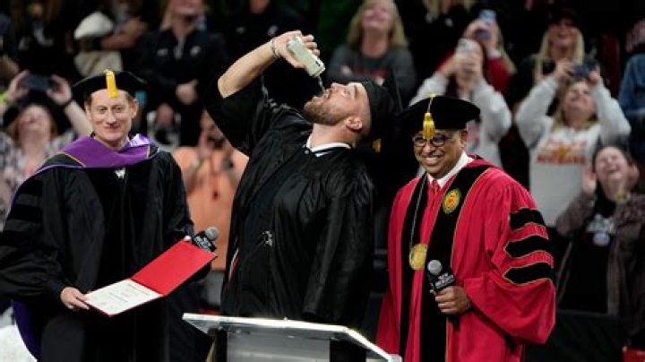 Travis Kelce chugged a beer while receiving his University of Cincinnati diploma