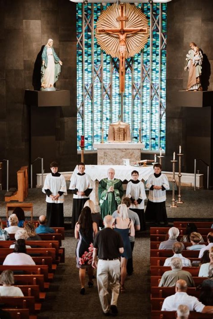 What gifts are usually brought forward at the offertory procession?